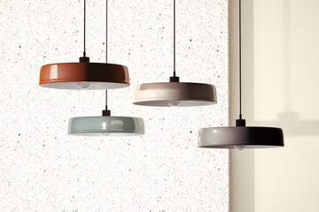 Ceiling lamps next to a light colored wall