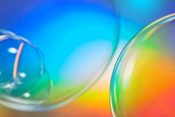 Translucent bubbles on multicolour background.