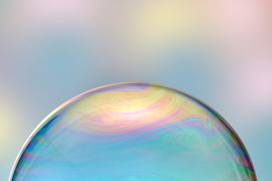 Soap bubble with iridescent flare.