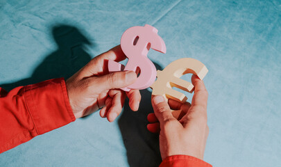 man with the dollar and euro symbols