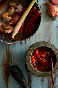 Pounding sambal spice paste