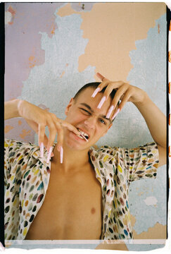 Trendy model biting fingers