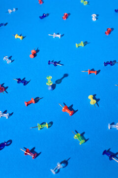 One pin stands on a blue background