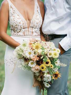 close up of a wedding flower arrangement held by the bride 