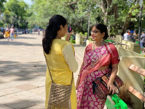 Mother and daughter interacting at outdoors at daytime