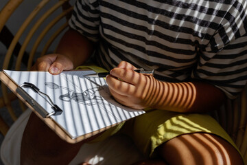 kid drawing a sketch