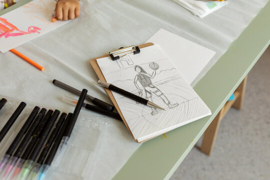 Children's drawing on table