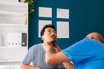 Doctor Examining Young Man 