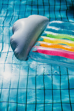 Rainbow and cloud inflatable pool mattress
