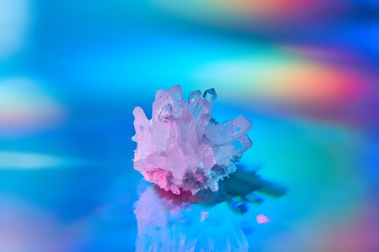 Beautiful rough crystal over colorful background