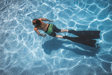 boy with freediving fins