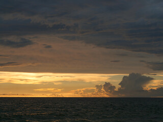 Fototapeta na wymiar Three Layered Horizon Over Ocean at Dusk