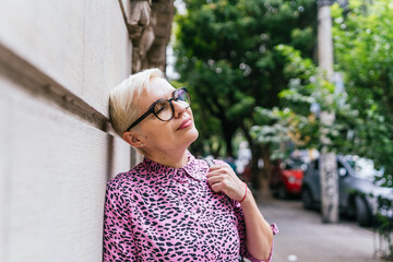 Vibrant Woman Against Wall