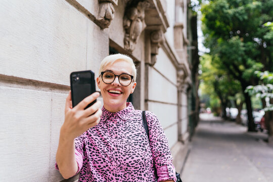 Joyful Woman Taking A Selfie 