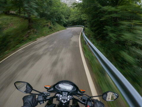 Motorbike speed on a curvy mountain road. 