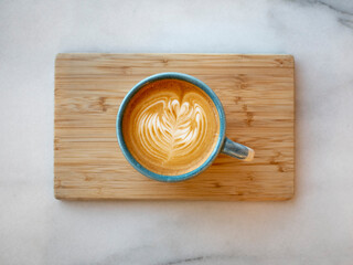 Cappuccino in a blue cup