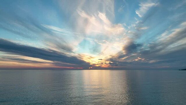 Cloudy sunset at sea aerial view 4 K