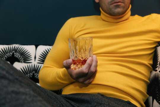 Fashionable Man With Drink in Hand