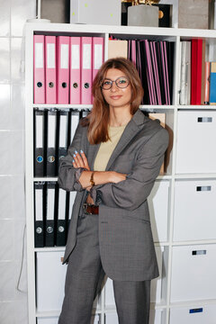 Confident businesswoman with arms crossed