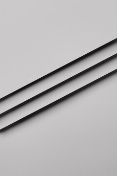 Abstract grey monochrome geometric shapes made out of paper