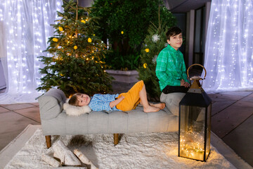 Brothers christmas portrait outdoors