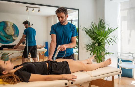 Physiotherapist Giving A Massage In A Clinic.