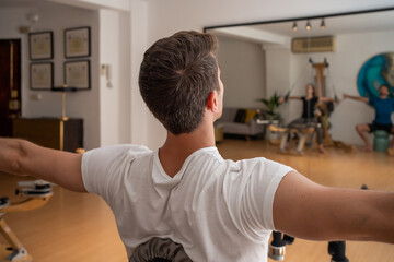 Young Man In A Physiotherapy Center. 