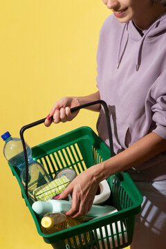 Female holding a shopping basket