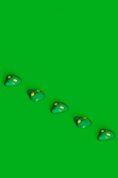 a row of alien faces