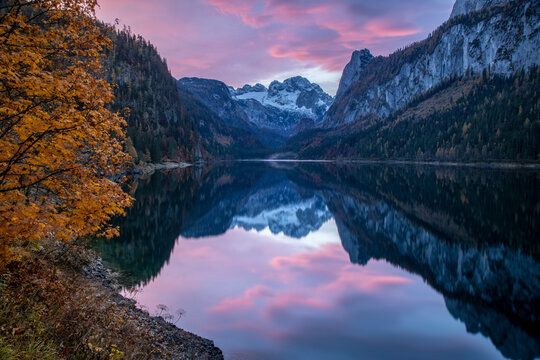 Bestutiful Mountain Lake In Autumn During Sunset With Purple Clouds