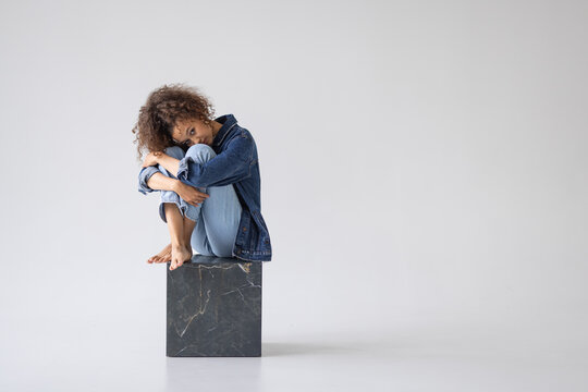 Woman on a cube