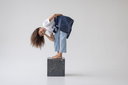 Woman on a cube