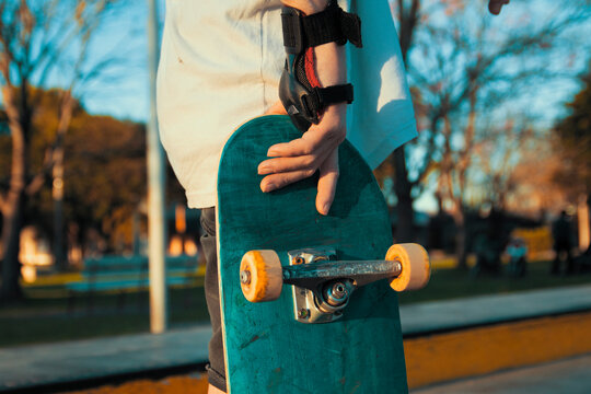 Low Section Of Skateboarder Wearing Protective Equipment