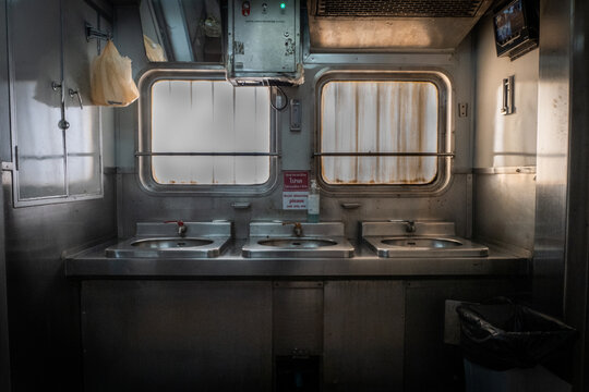 A public sink inside of a train car