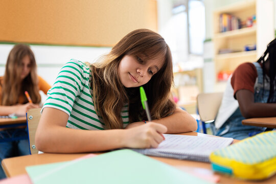 Girl taking notes
