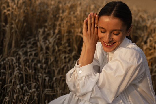 Girl in linen blouse taking breather in nature 