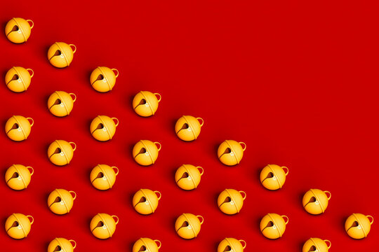 many golden bells on red background