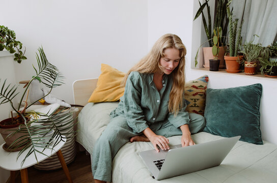 
girl working on laptop at home