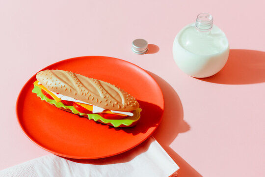 plastic sandwich and bottle with milk