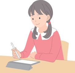 タブレットで勉強をする女子学生