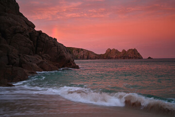 Fototapeta premium Porthcurno, United Kingdom Sunset With Rainbow