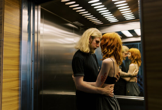 Couple inside the elevator