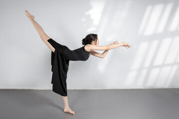 Beautiful young girls are dancing in the studio