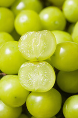 closeup of seedless green Shine Muscat grape background