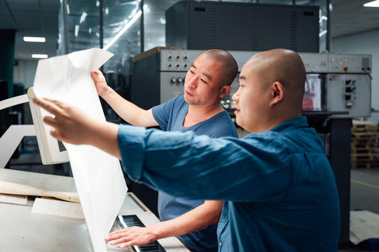 Asian workers in printing industry