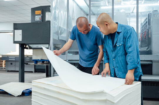 Asian workers in printing industry