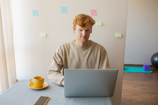 nice man working on laptop
