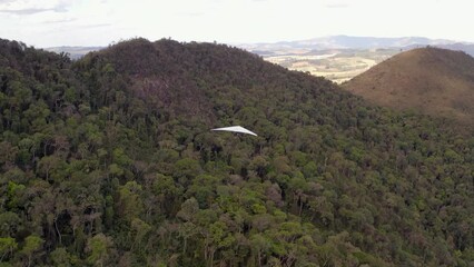 Aerial view from hang glider flying above the Brazilian mountains