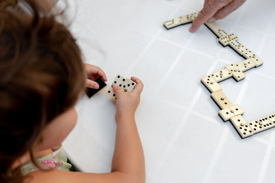 Playing dominoes with great grandfather