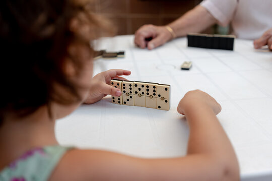 Playing dominoes with great grandfather